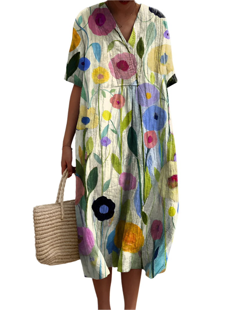 Kjole med Farverige Blomster | Elegant Snit og Komfortabel Stil