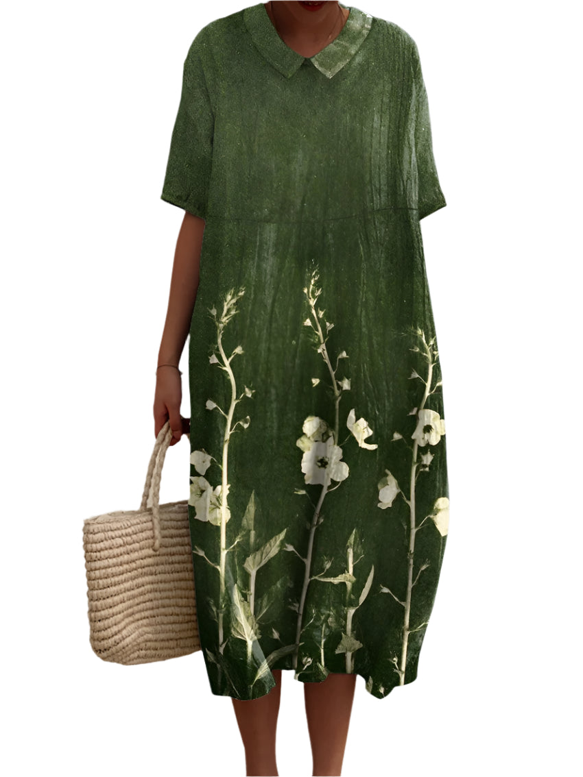 Kjole med Farverige Blomster | Elegant Snit og Komfortabel Stil